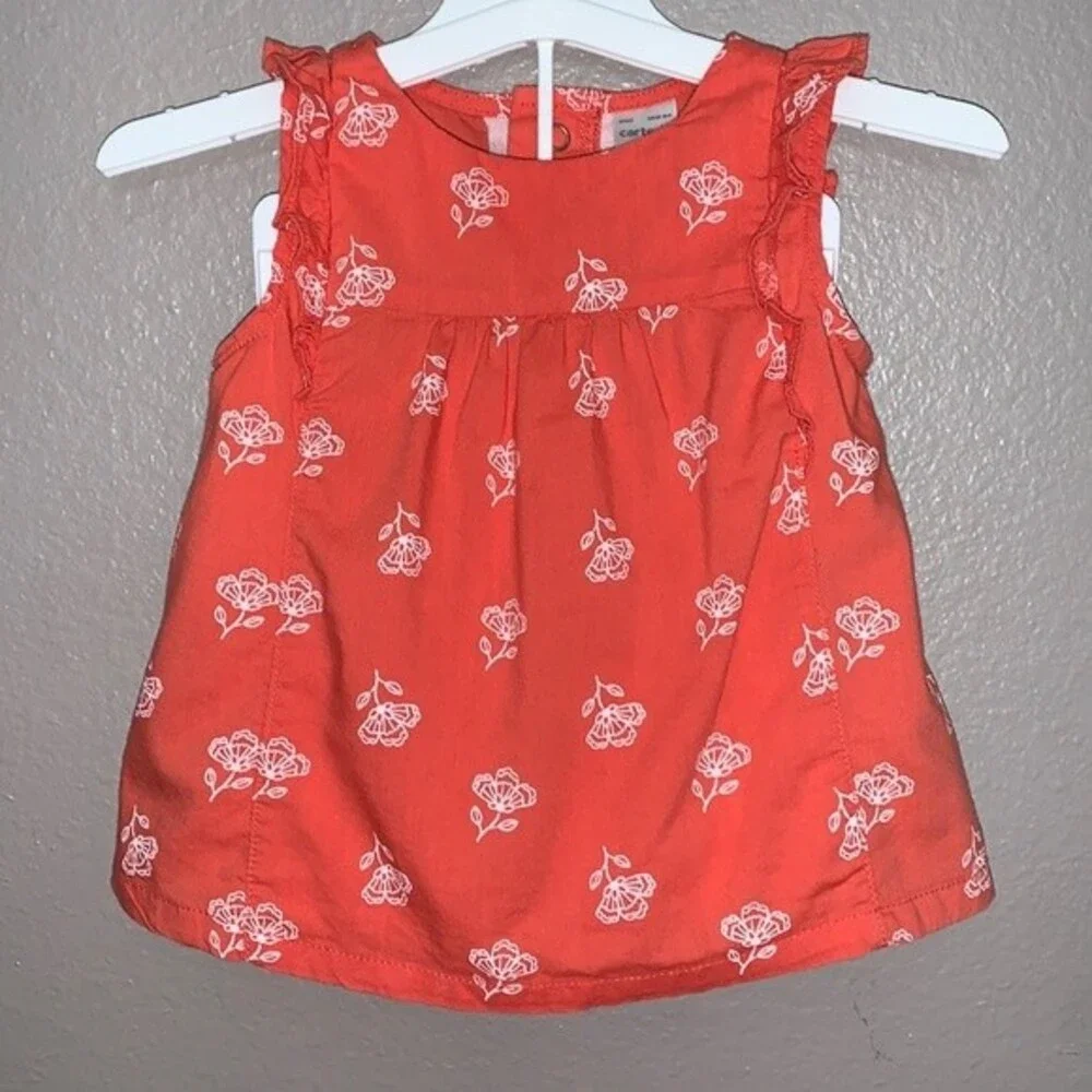 Carter's 12 month baby girl set of top and shorts.